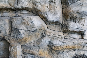 texture, stone wall consisting of stone blocks of various shapes