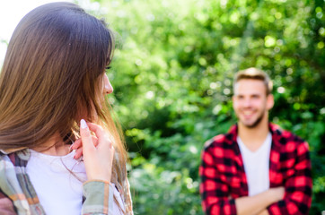 Fototapeta premium Get her attention. Man hipster falling in love pretty girl. Casual meeting. Love from first sight. If woman knows you like her how will she react. Fall in love. Pure feelings. Romantic date concept