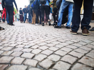 People waiting in line on Ghent street