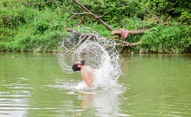 feeling free. bearded man swimming in lake. summer vacation. mature swimmer. brutal hipster with wet beard. refreshing in river water. water beast. furry monster. wild man. time to relax