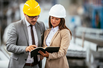 Man and woman discussing work