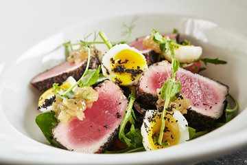 Exquisite Serving White Restaurant Plate of Tuna Fillet Salad with Quail Eggs and Salsa from Sweet...