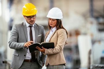 Man and woman discussing work