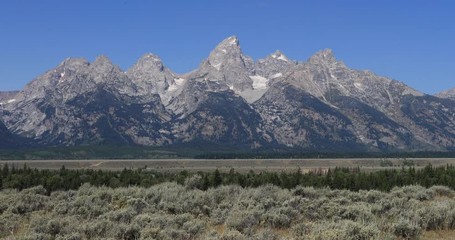 Grand Teton mountain range Wyoming. Mountaineering, hiking, fishing and recreation.  2.5 million visitors a year. Geography, geology, environment, history, landscape
