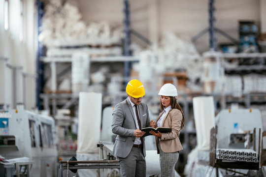 Man and woman discussing work