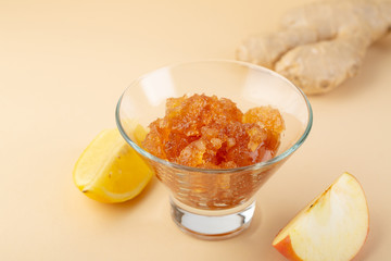 Apple and lemon fruit jam in glass, food close-up