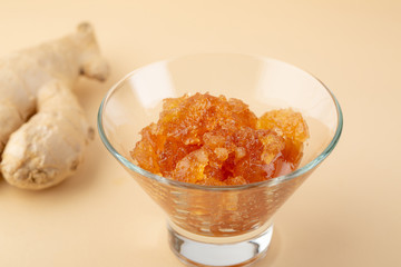 Ginger and lemon fruit jam in glass, food close-up