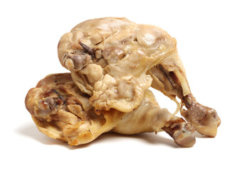 Cooked chicken leg on white background