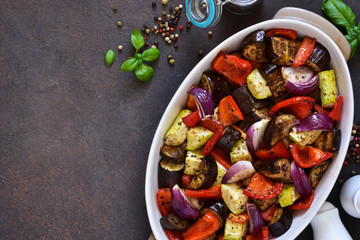 Oven Roasted Vegetables: zucchini, eggplant, tomatoes, paprika. Ratatouille is a rustic dish of vegetables.