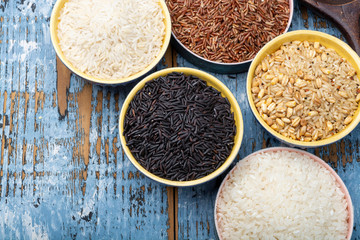 Different types of rice, white basmati, jasmine, arborio, brown and black