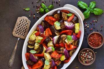Oven Roasted Vegetables: zucchini, eggplant, tomatoes, paprika. Ratatouille is a rustic dish of vegetables.