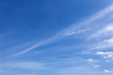 Obraz premium Sunshine clouds sky during morning background. Blue,white pastel heaven,soft focus lens flare sunlight. Abstract blurred cyan gradient of peaceful nature. Open view out windows beautiful summer spring