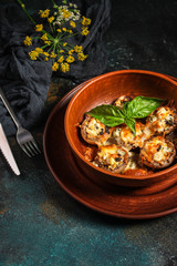 mushroom stuffed cheese (delicious baked vegetable dish, no meat) menu concept. food background. copy space. Top view