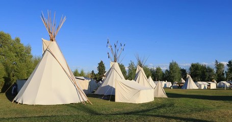 Rocky Mountain Man Rendezvous tent Indian tee pee. 19th century fur trading outpost. Oregon, California and Mormon Trails. Pioneer, wilderness attire, camping and  old trapper skills.