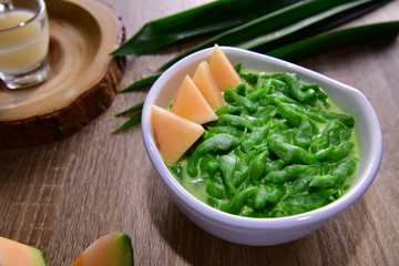 Lod Chong traditional Thai desserts in Thailand. That made with pandan syrup in coconut milk and thai melon the taste is fragrant sweet cold.