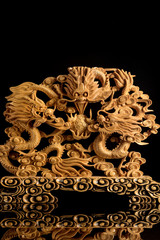 Wood carving on a black background