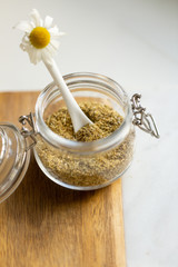 chamomile tea on marble background with copy space. Relax concept