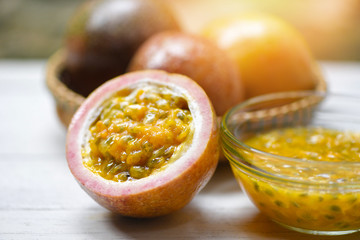 Fresh Passion fruit juice on wooden table passionfruit slice half smoothie