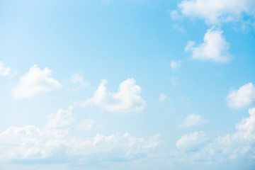 Nature Bright blue Sky with white clouds on blackground. Beautiful sky and clouds in the afternoon.
