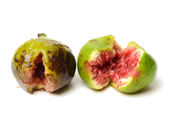 Ripe figs on a white background