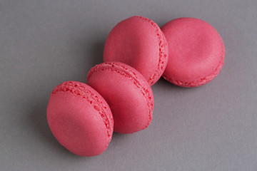 Macaroons of pink color tasty french cookies beautiful macro food photo