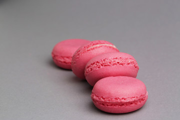 Macaroons of pink color tasty french cookies beautiful macro food photo