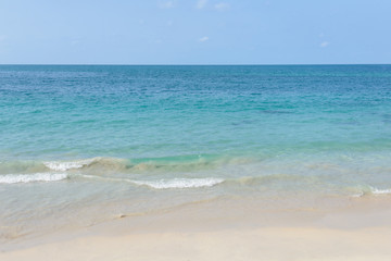 Beautiful sand beach and tropical sea at sunny summer day. Travel vacation relax concept.