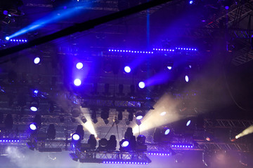 Fototapeta na wymiar Blue light on a rock concert stage as background