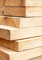 Wooden boards for building a house as a background