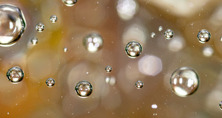 Bubbles of air on the surface of water as an abstract background