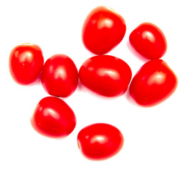 Red cherry tomatoes on a white background