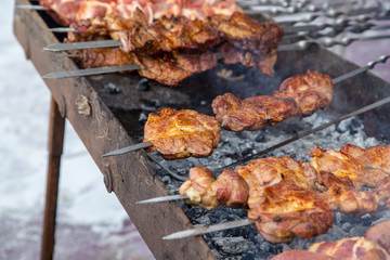 Barbecue skewers grilled on charcoal