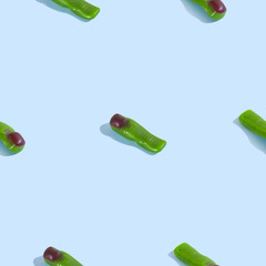 Creative seamless pattern with jelly finger zombie on light blue background. Halloween abstract background