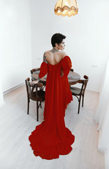 female with short haircut poses in Tbilisi loft