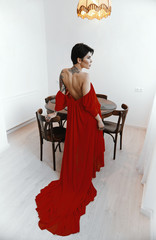 female with short haircut poses in Tbilisi loft