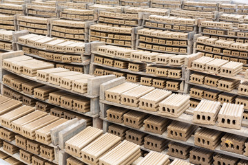 Brick piles placed on the factory floor.