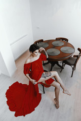 female with short haircut poses in Tbilisi loft