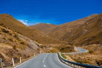driving in New Zealand with a mountain view