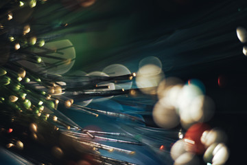 Beautiful optical fiber colored  line bokeh on a dark background.