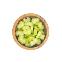 fresh Celery sticks, celery stalk slice in wooden bowl isolated on white background