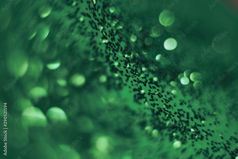 Aufkleber beautiful abstact light bokeh on a green background.