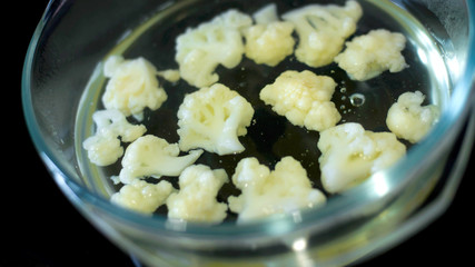 Quickly prepare the cauliflower. Dietary, proper, baby food concept.