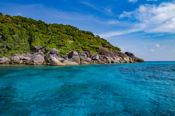 Naklejka premium Thailand beach. Andaman Sea. Island in Thailand. Phang Nga Bay National Park. Thailand Travel Guide. Not far from Phuket. Tourism in Asia. Huge stones on the shore. Sea water. Cruise.