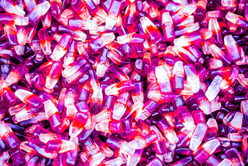 background of many small cola bottle candies as background