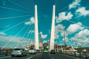 Fototapeta premium Tall white curtain car bridge with road
