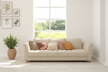 Stylish room in white color with sofa and summer landscape in window. Scandinavian interior design. 3D illustration