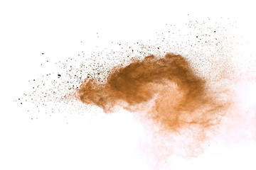 Explosion of brown powder on white background. 