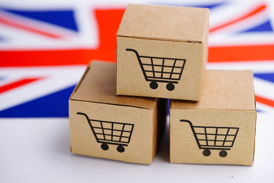 Box with shopping cart logo and United Kingdom flag : Import Export Shopping online or eCommerce finance delivery service store product shipping, trade, supplier concept..