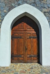 a broken arch style door