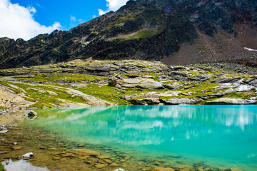 Fototapeta na wymiar small alpine lake in Tyrol eleven
